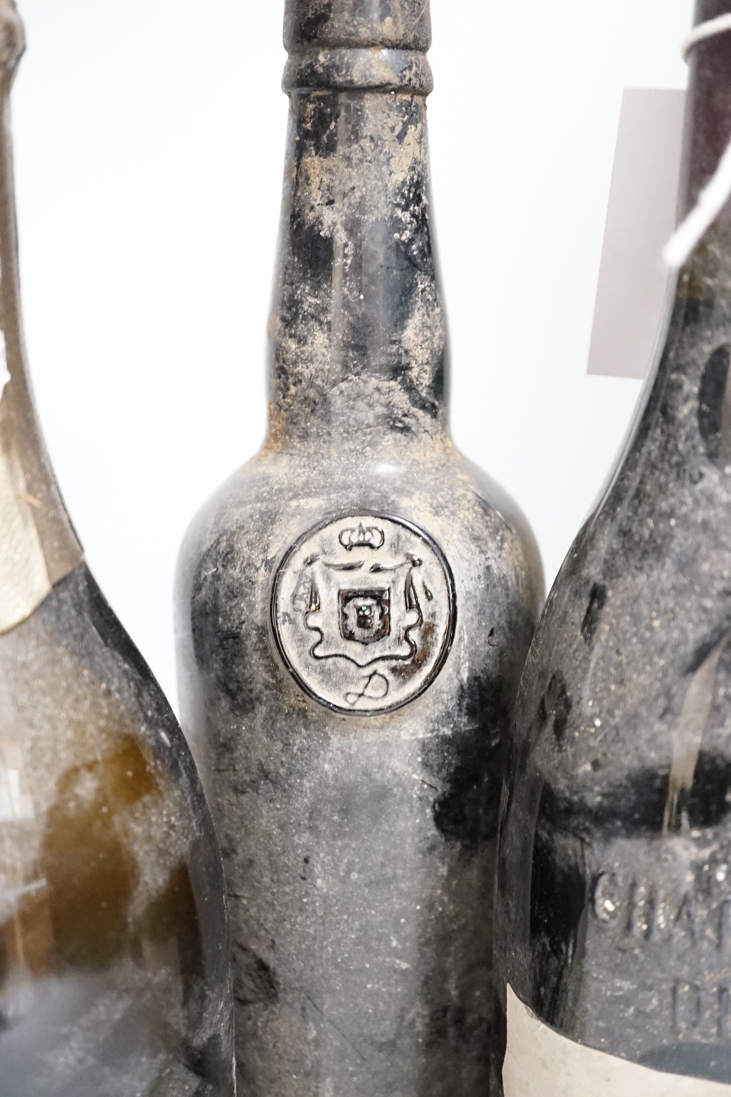 Three bottles of Chateauneuf-du-pape, One bottle of Pomerol, one bottle of port and one bottle of champagne